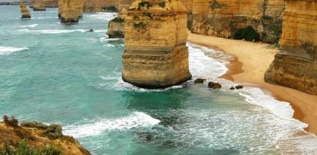 a large rock formation on a beach